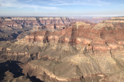 view from inside helicopter of Grand Canyon