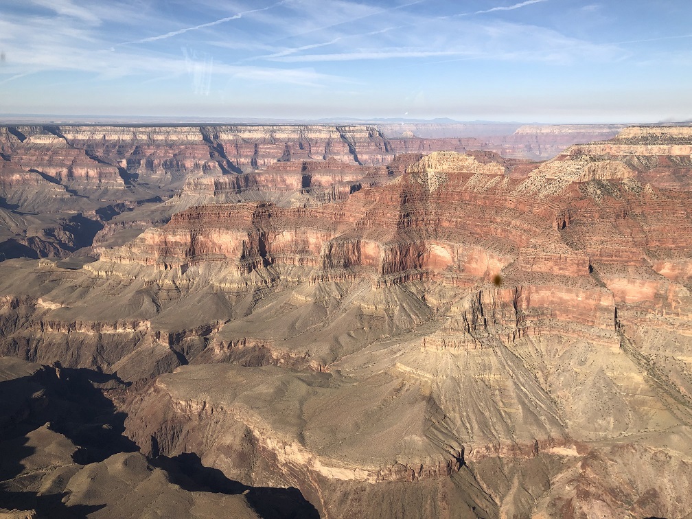 view from inside helicopter of Grand Canyon
