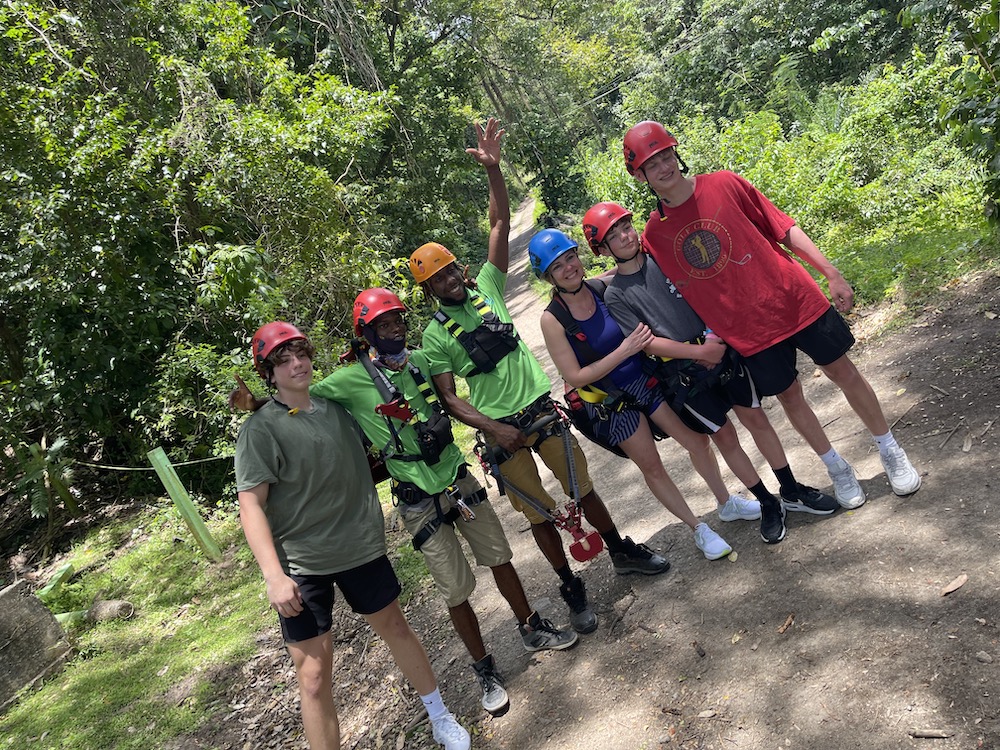 This image has an empty alt attribute; its file name is zipline-crew.jpeg